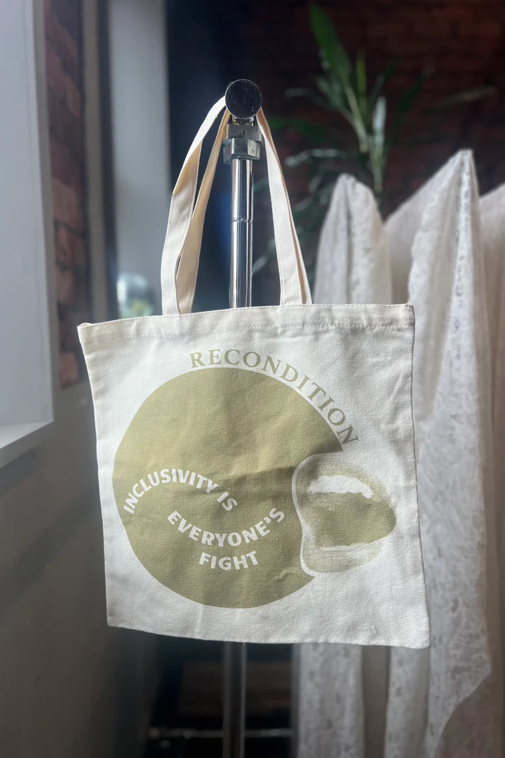 Recondition Tote Bag with slogan: Inclusivity's everyone's fight 